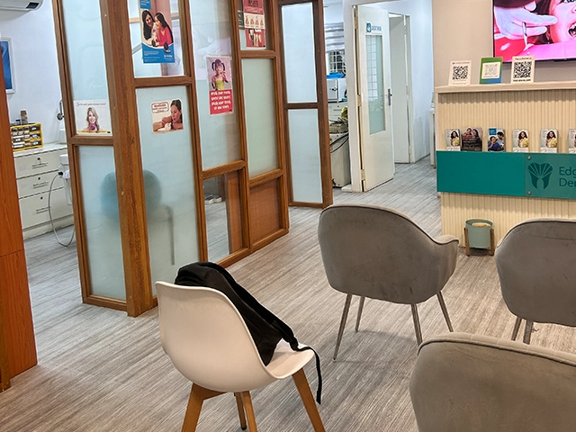 Relax in a spacious clinic featuring elegant interiors, design, & modern patient seating in Alwarpet