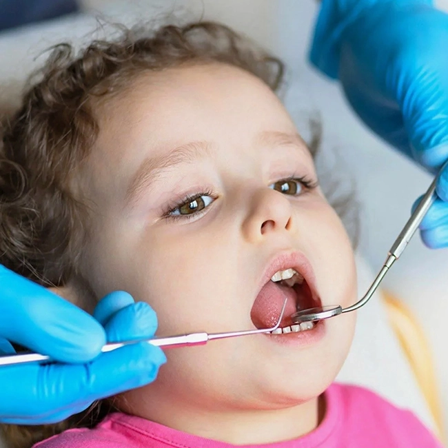 Pediatric dentist provides gentle, expert dental care treatments for children using advanced methods